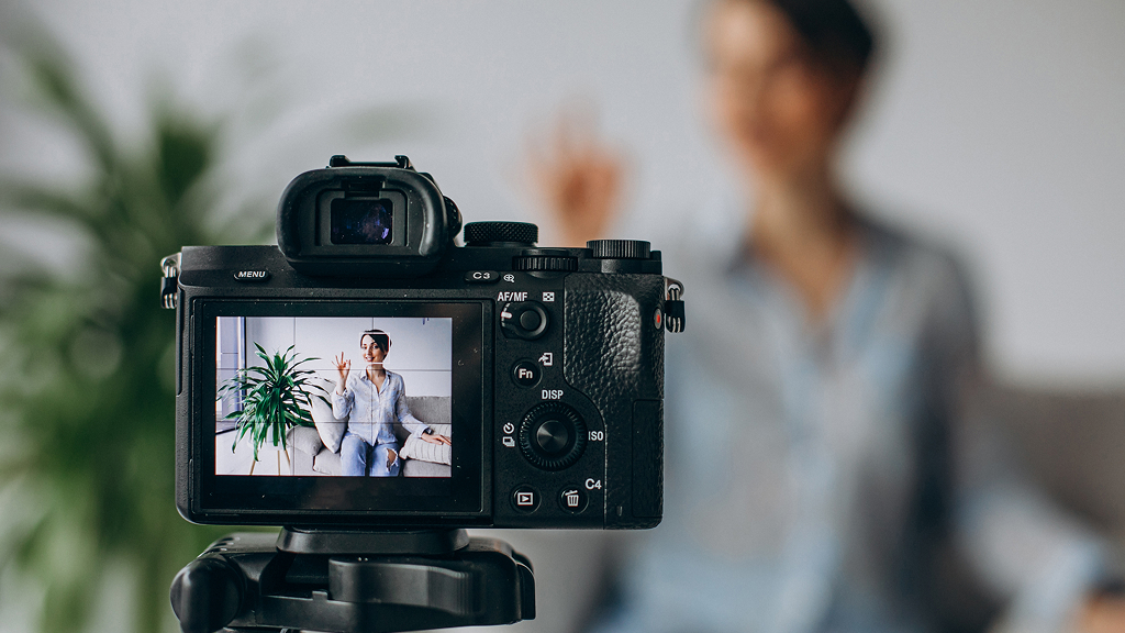 A girl making a video for the GoPro challenge